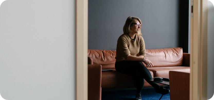Person on couch getting consultation