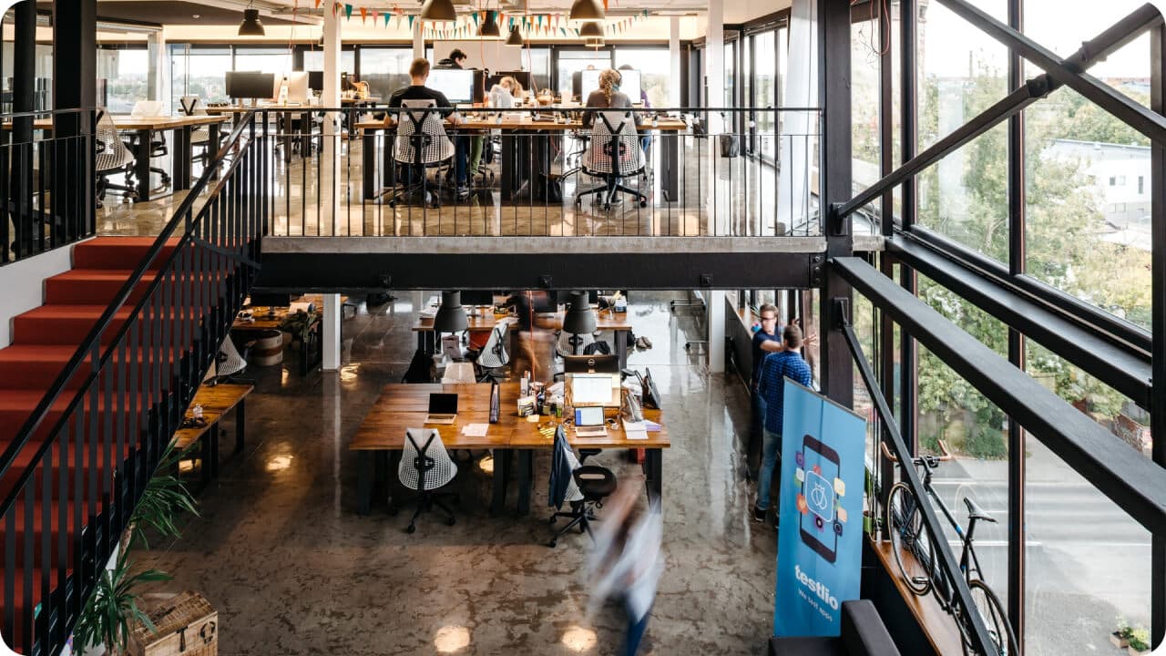 Spacious office view people working