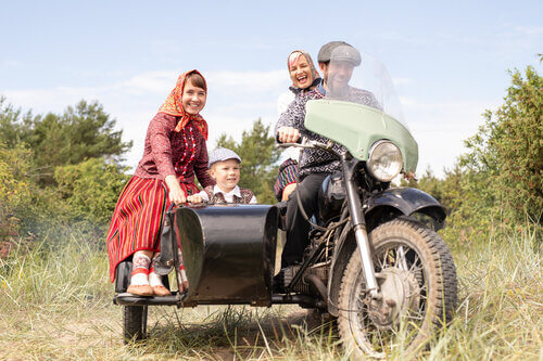 A family on a motor bike in Kihnu Island, Estonia