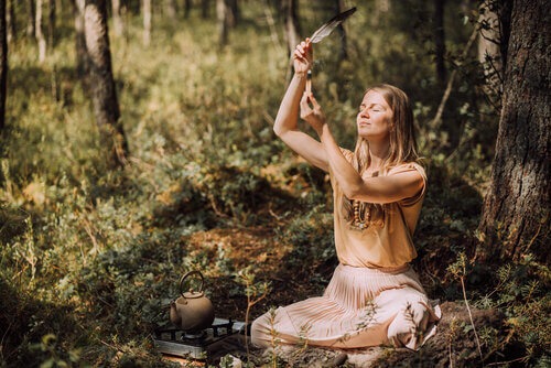 Estonian woman in the forest at Vae Farmsted